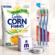 Tri popularna proizvoda na svijetloj podlozi: Nestlé GoFree Corn Flakes, Melem i četkice za zube Elmex Ultra Soft.