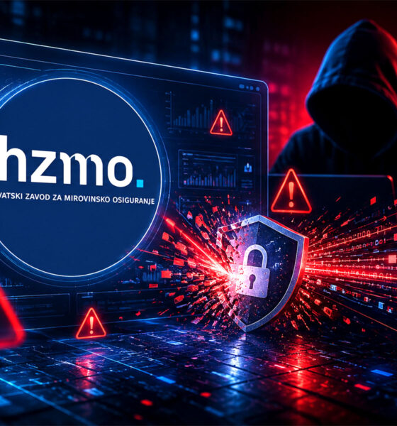 Ilustracija kibernetičkog napada na HZMO s prikazom logotipa Zavoda, upozorenjima, digitalnim sigurnosnim sustavom i anonimnim hakerom u crveno-plavom tehnološkom okruženju.