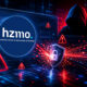 Ilustracija kibernetičkog napada na HZMO s prikazom logotipa Zavoda, upozorenjima, digitalnim sigurnosnim sustavom i anonimnim hakerom u crveno-plavom tehnološkom okruženju.
